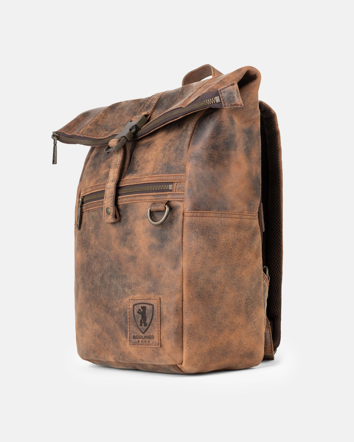 Side view of a earth leather backpack bag