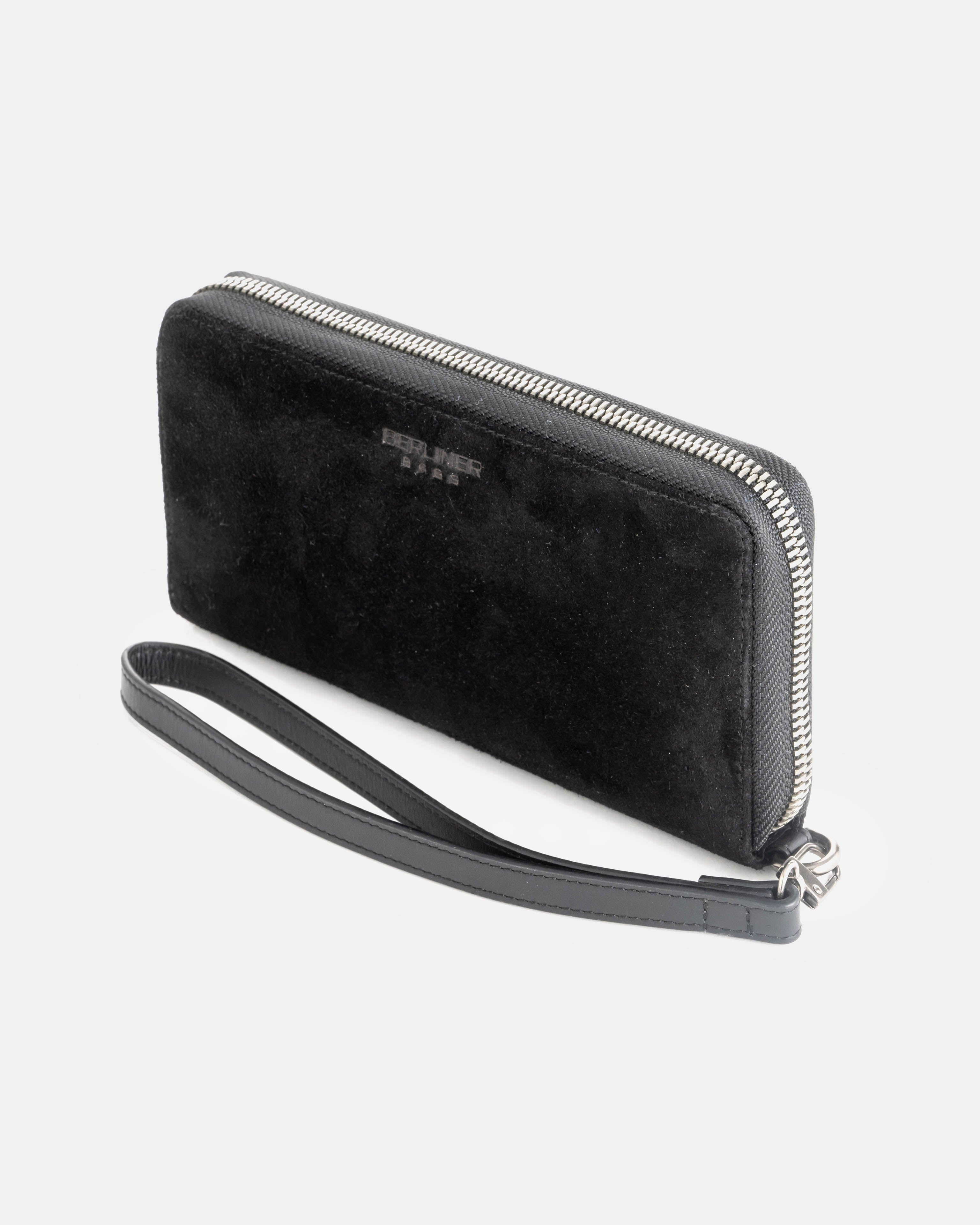 Three-quarter view of suede black leather wallet