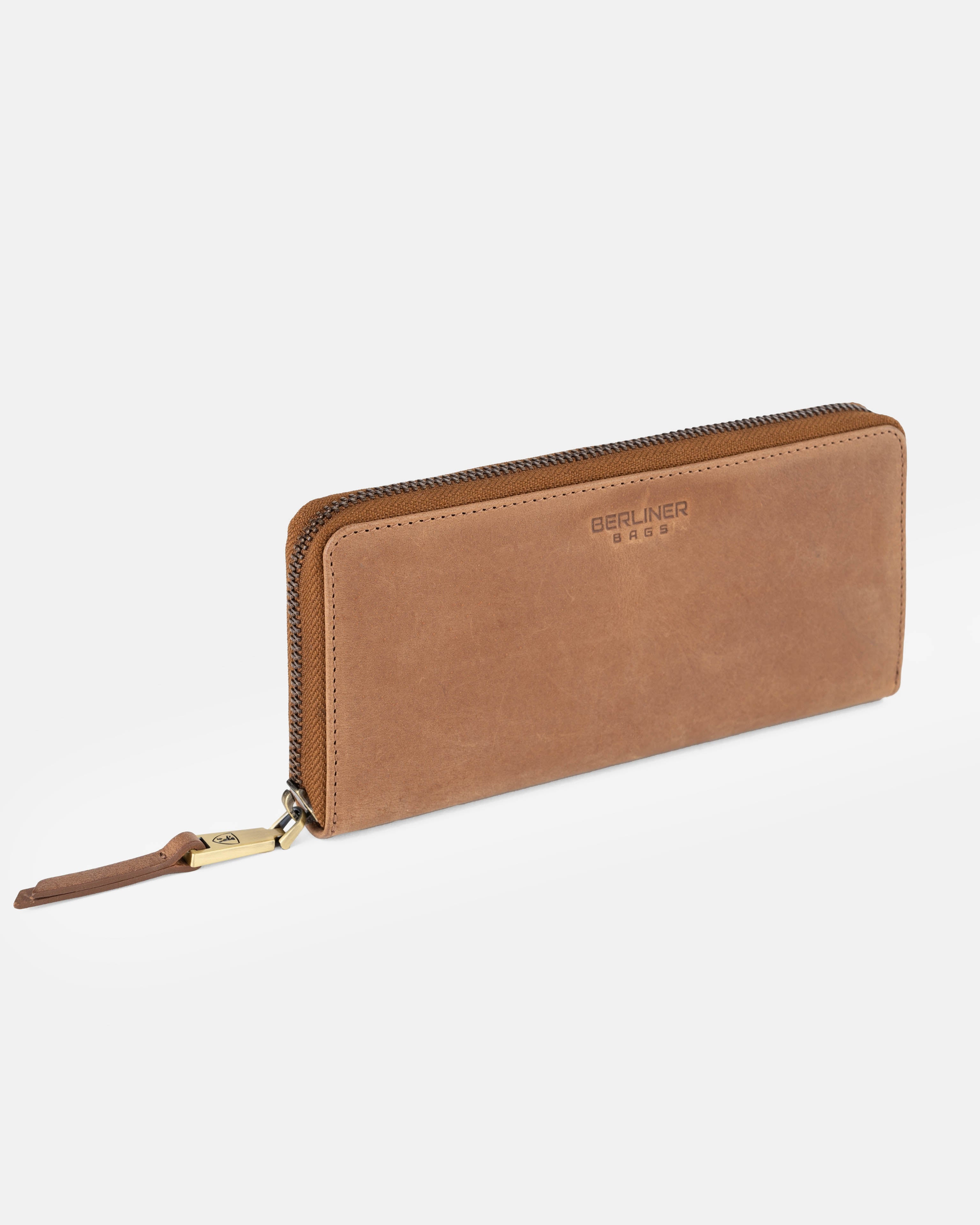 Side view of camel leather wallet with metal zipper