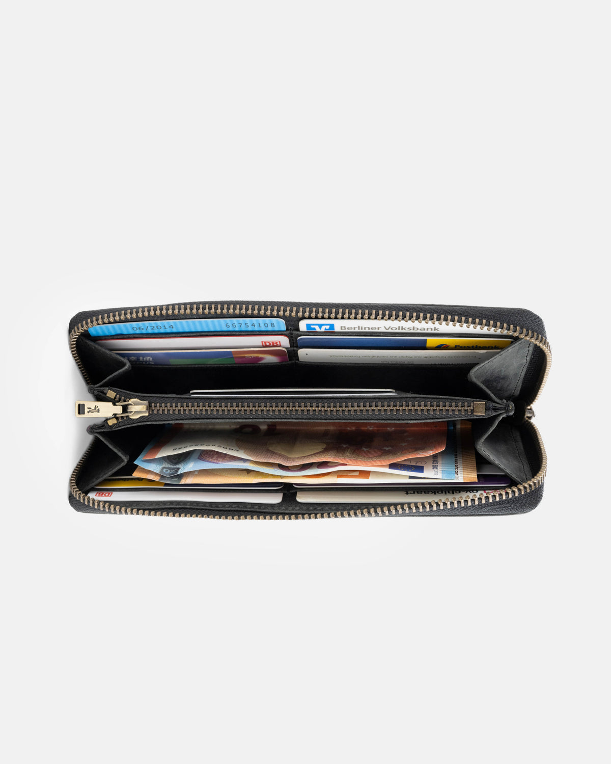 Top-down view of dark grey leather wallet showing inside slot