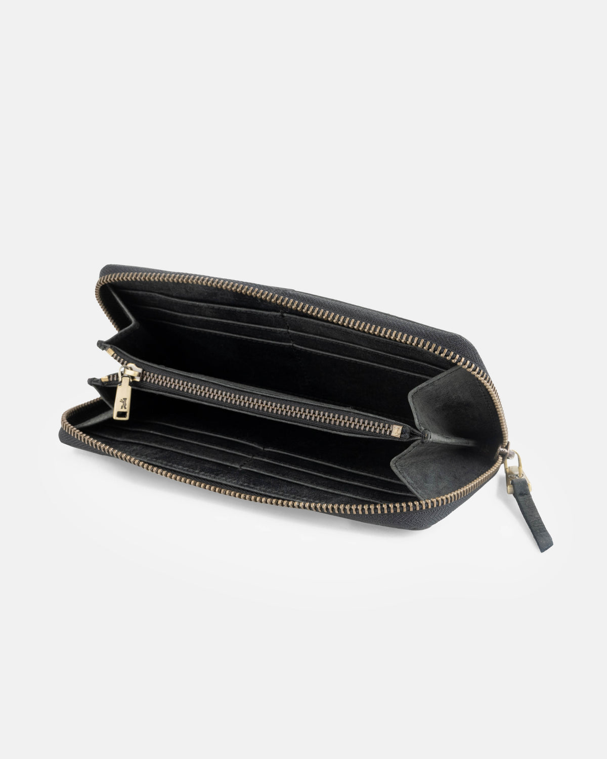 High-angle view of dark grey leather wallet showing inside
