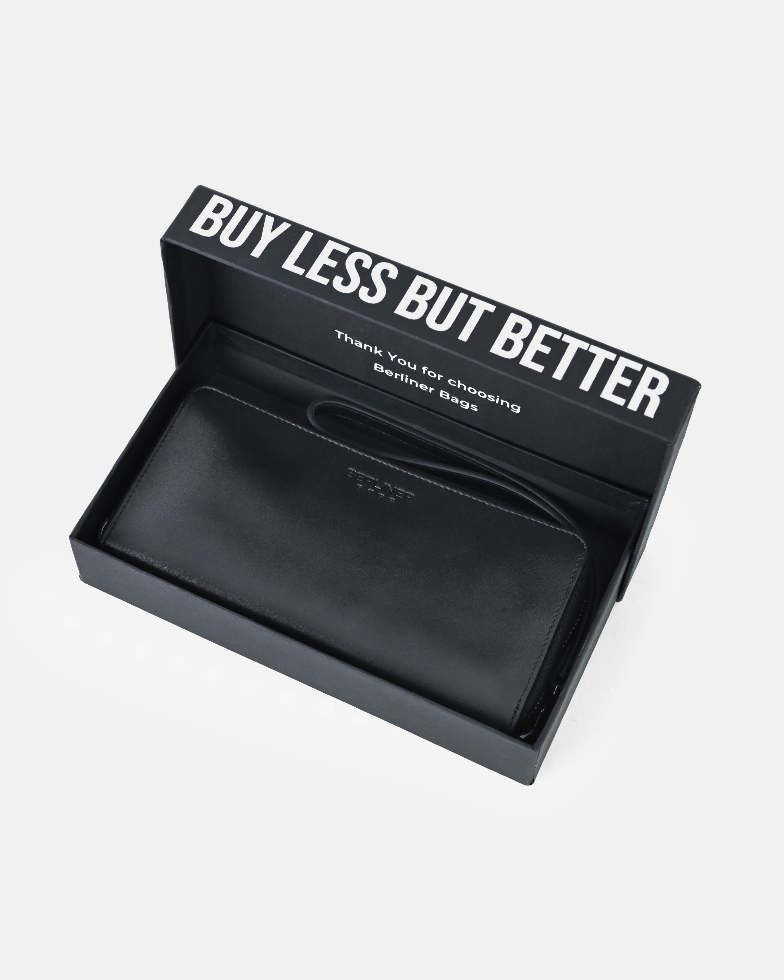 A black emboss leather wallet in a branded box