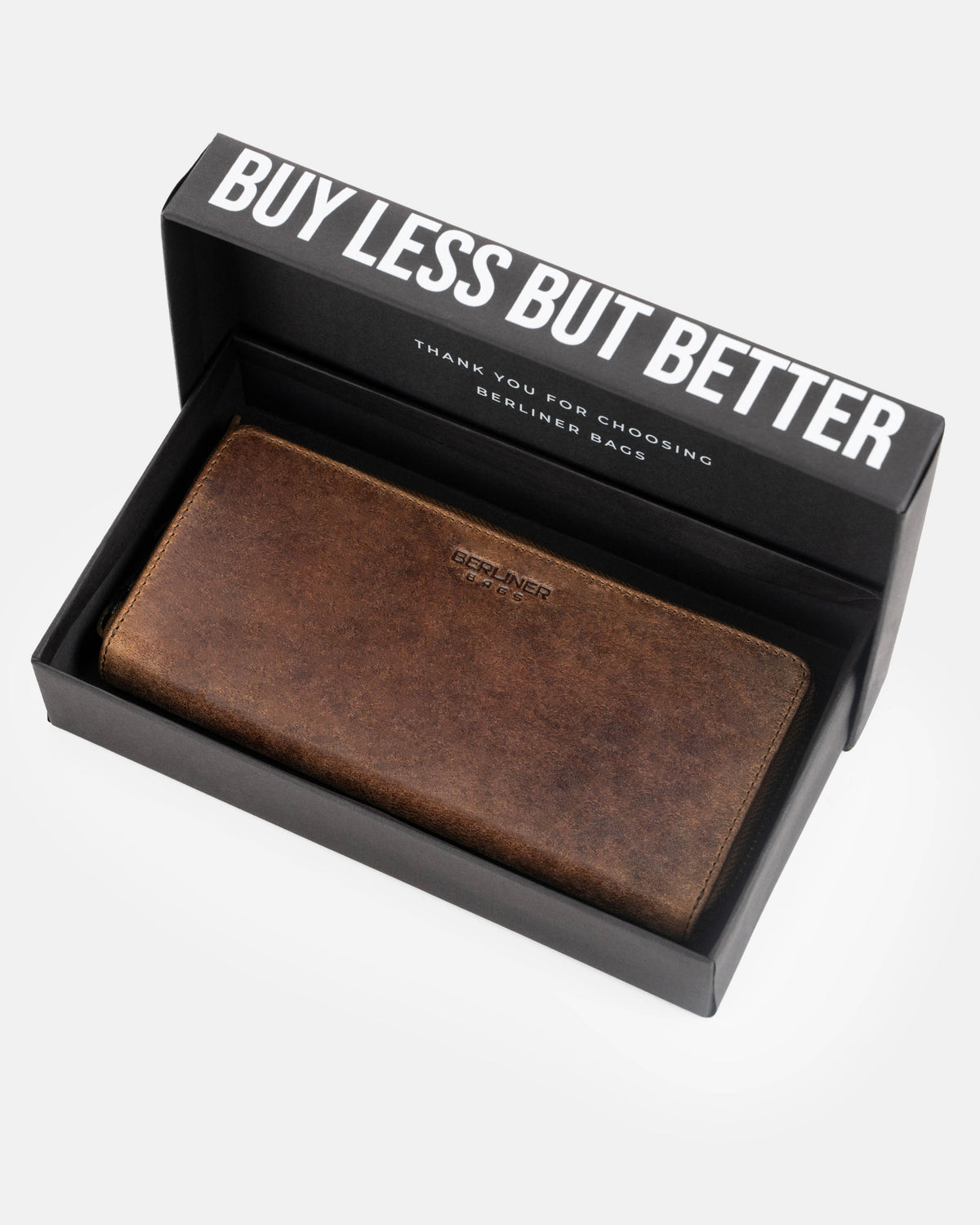 Walnut leather wallet inside the branded box