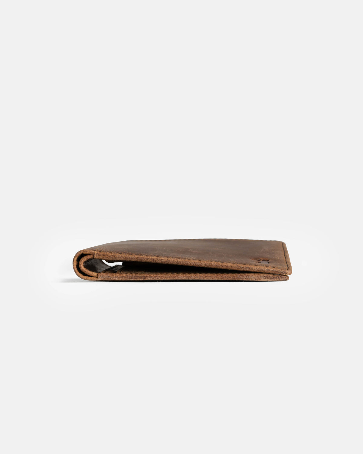 Bottom view of walnut leather wallet without ID flap