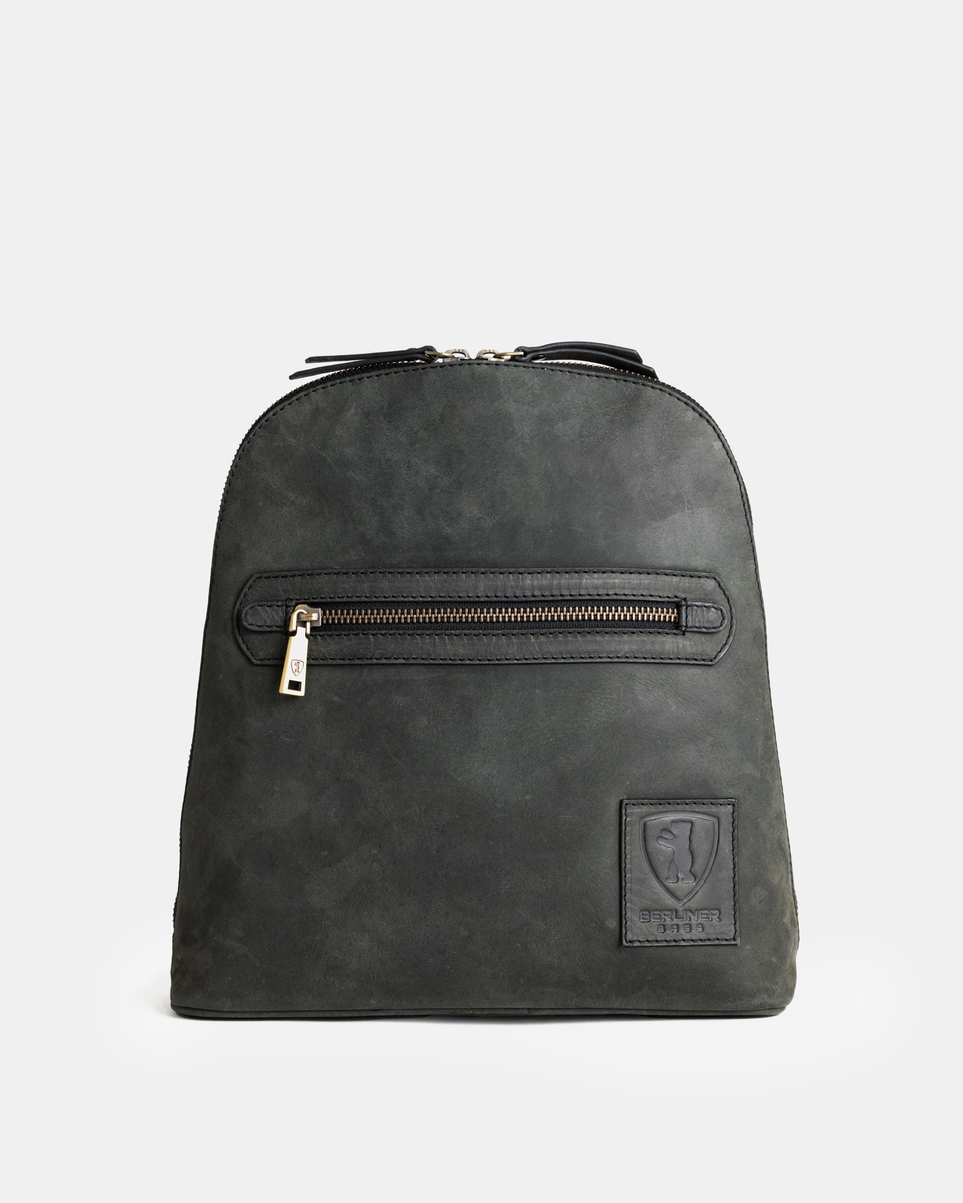 Front view of dark grey leather zip-around backpack.