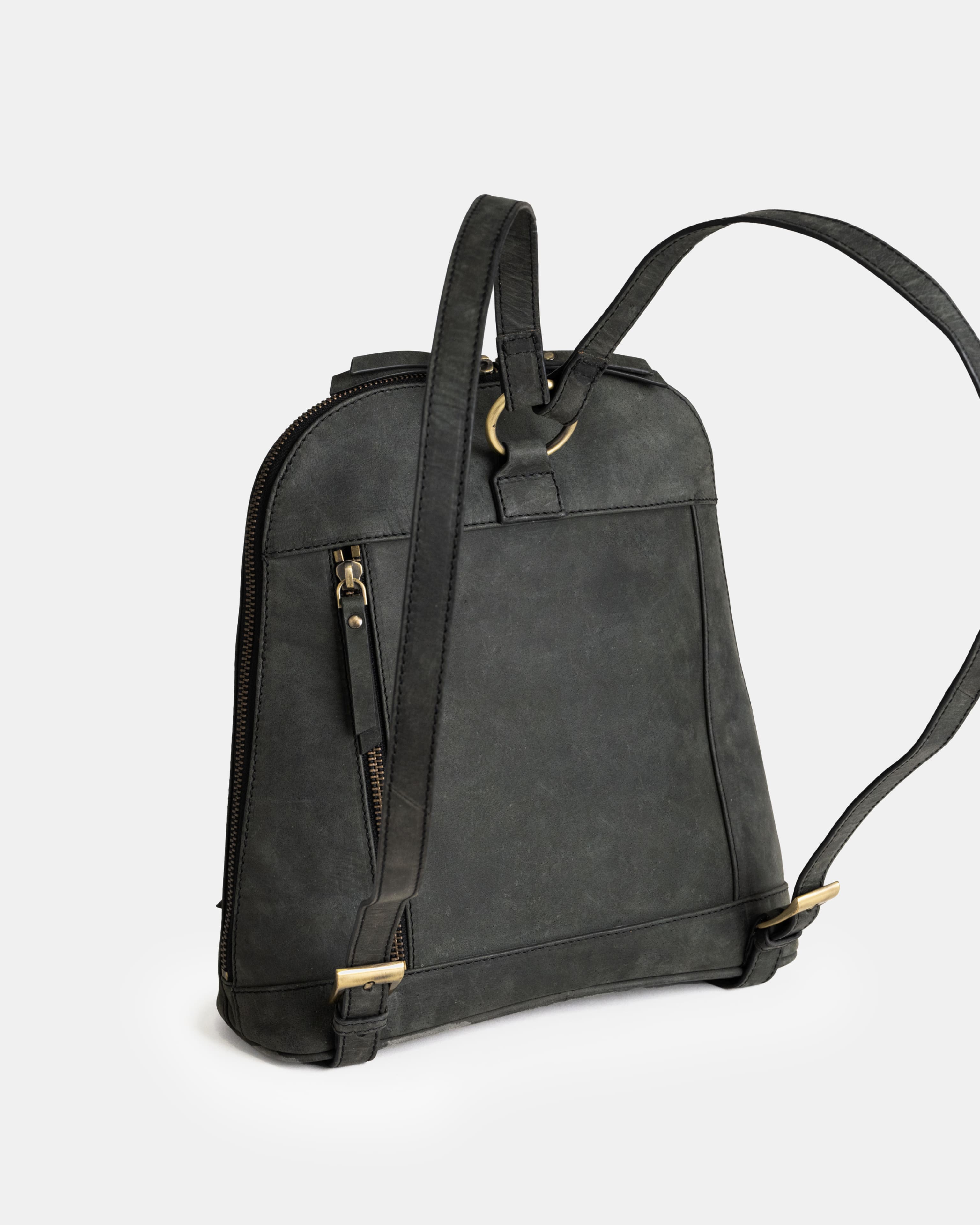 Rear studio view of dark grey leather zip-around backpack