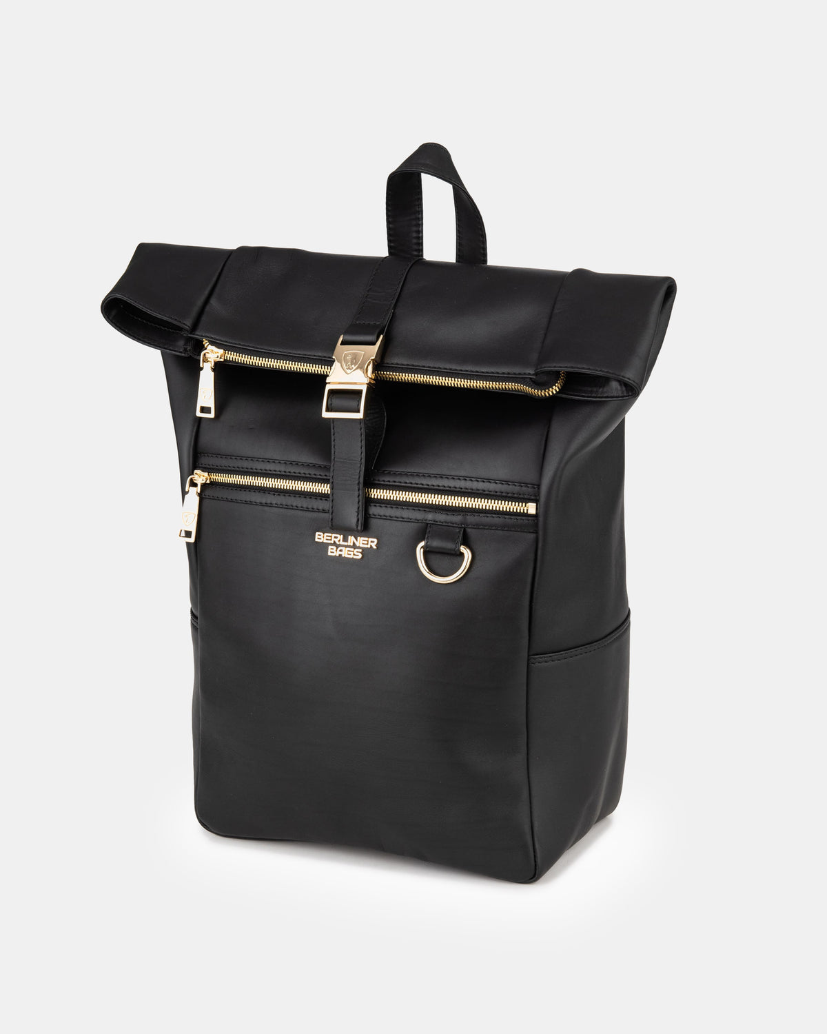 Three-quarter view of black backpack featuring gold metal buckle hardware