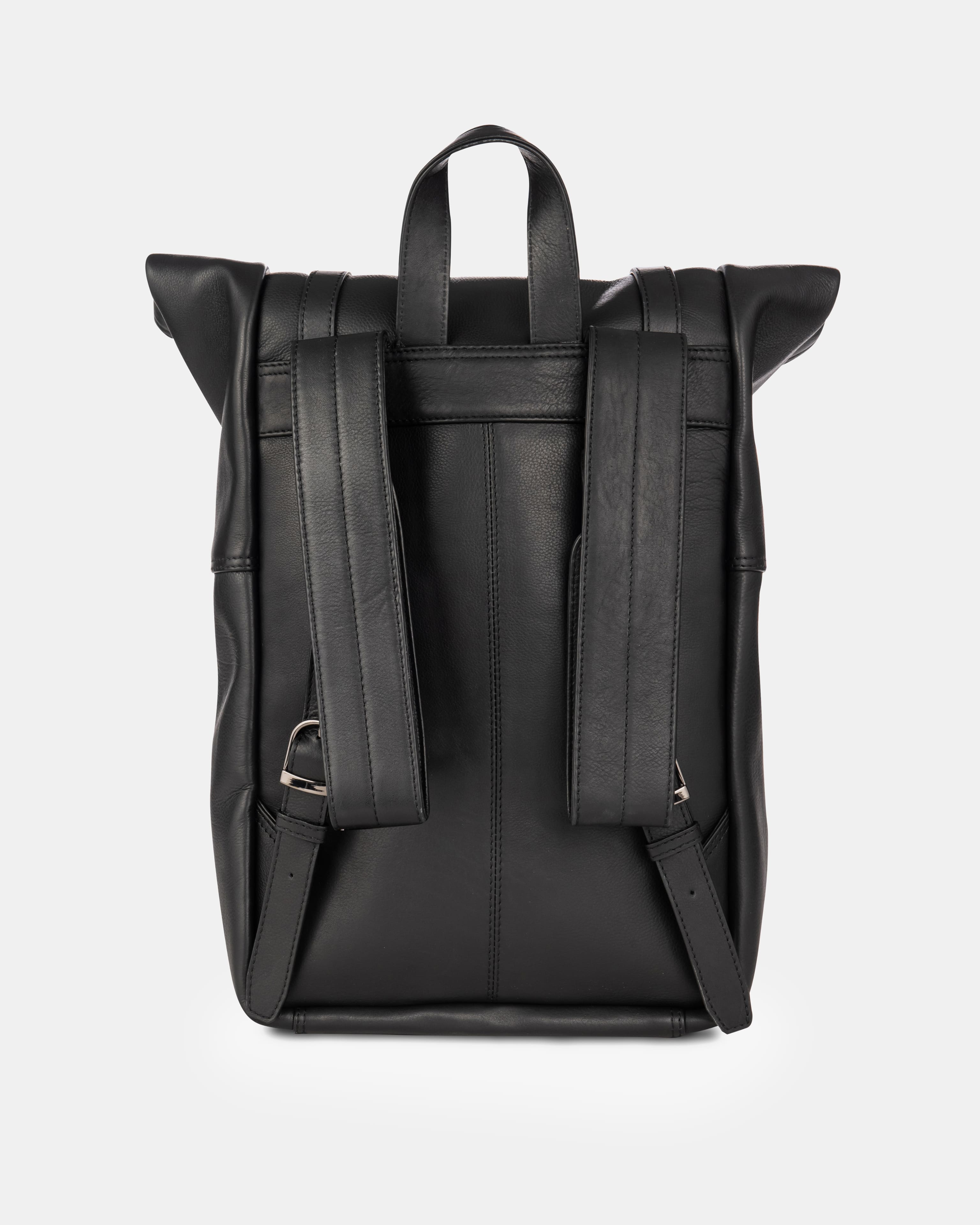 Rear product view of a black leather roll-top backpack showcasing the shoulder straps and leather handle