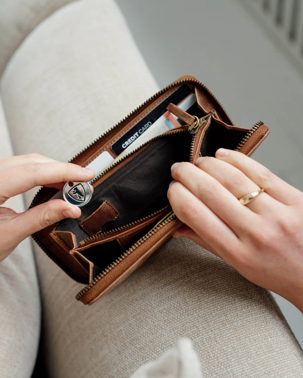 Top open view of camel leather wallet showing inside
