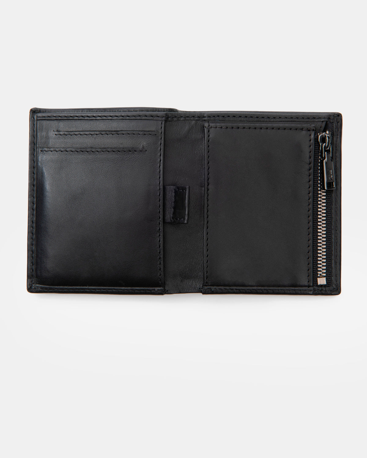 Open view of emboss leather wallet with black zip showing inside