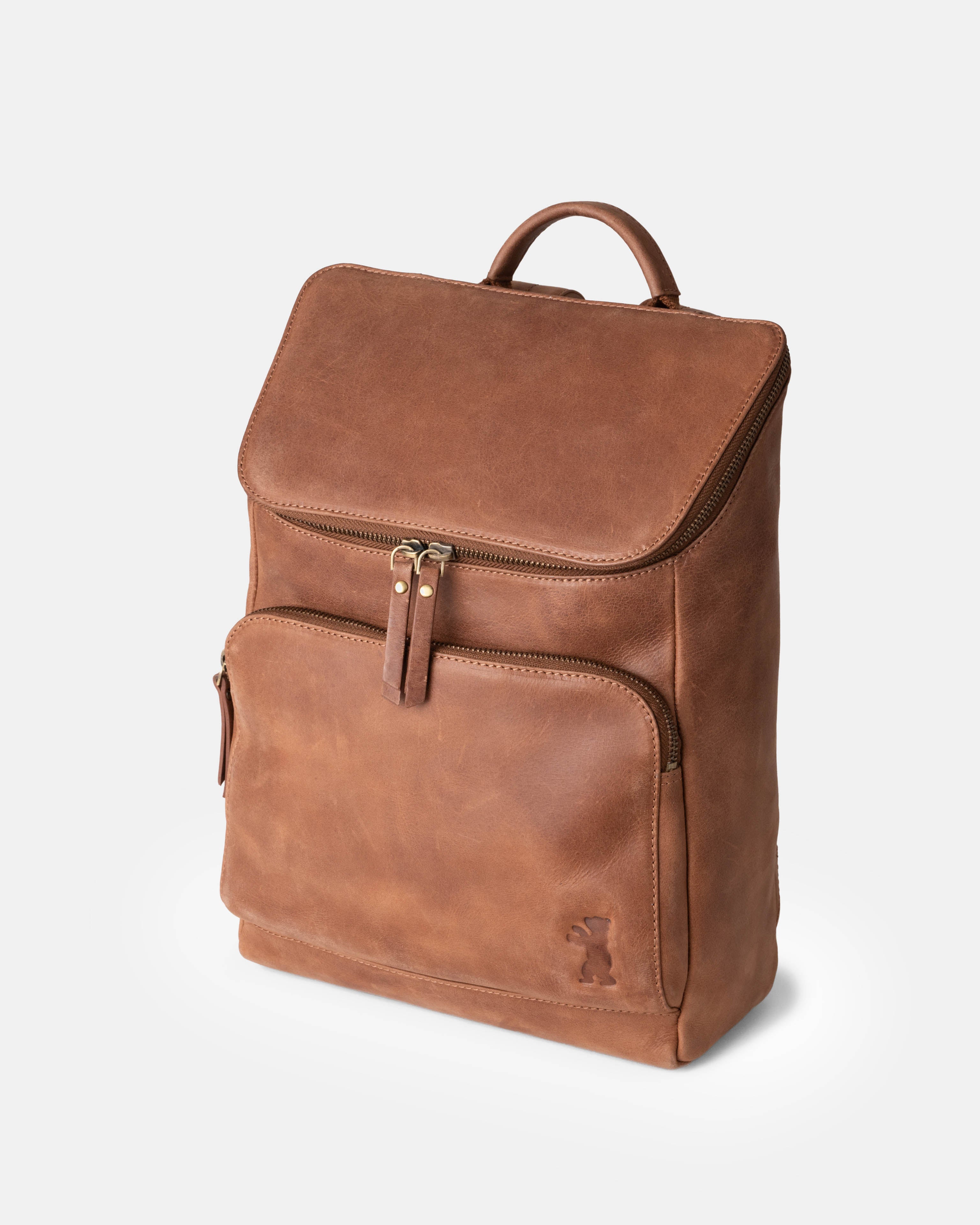 Three-quarter studio view of camel leather zip-around backpack