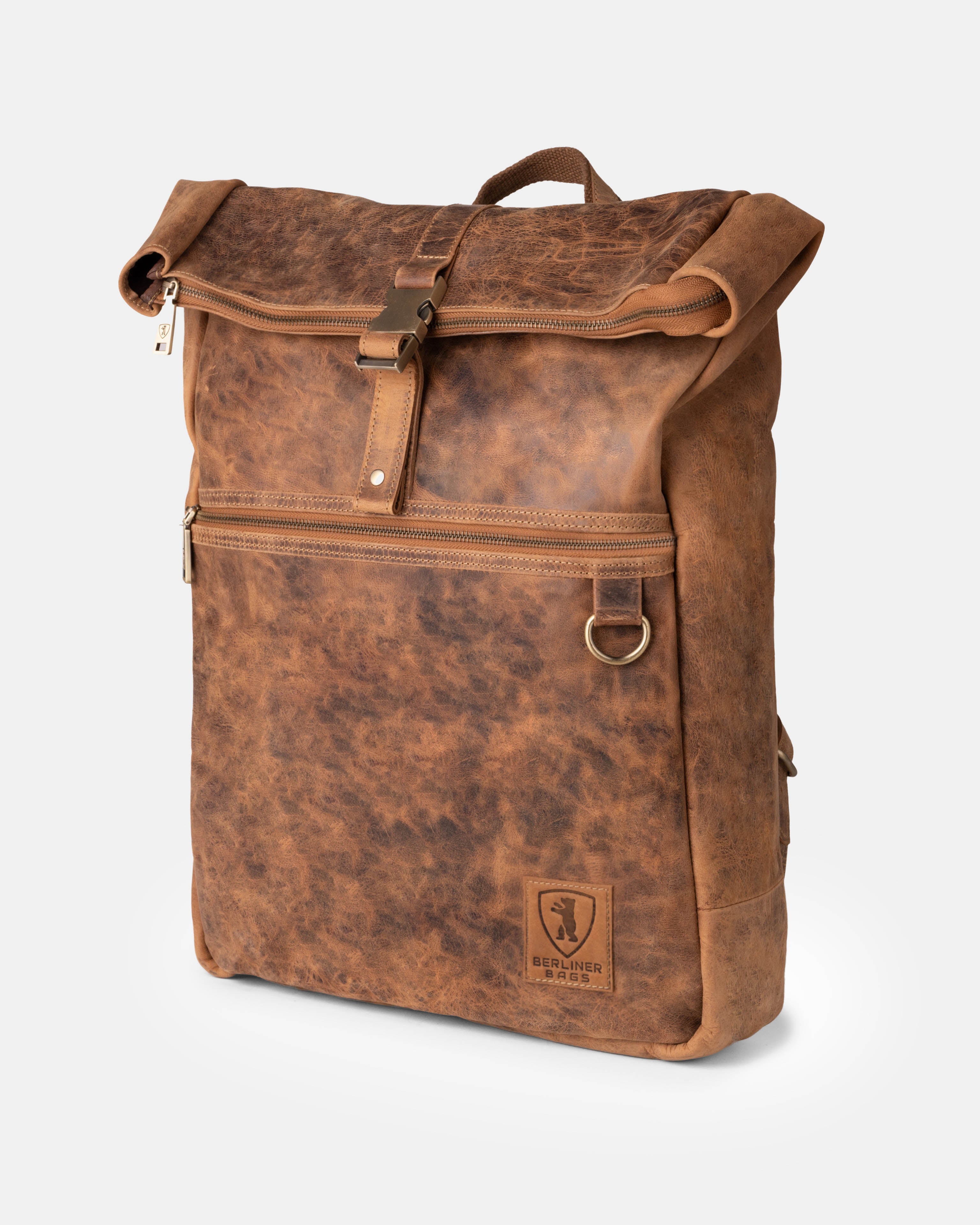 Front view of a walnut leather roll-top backpack