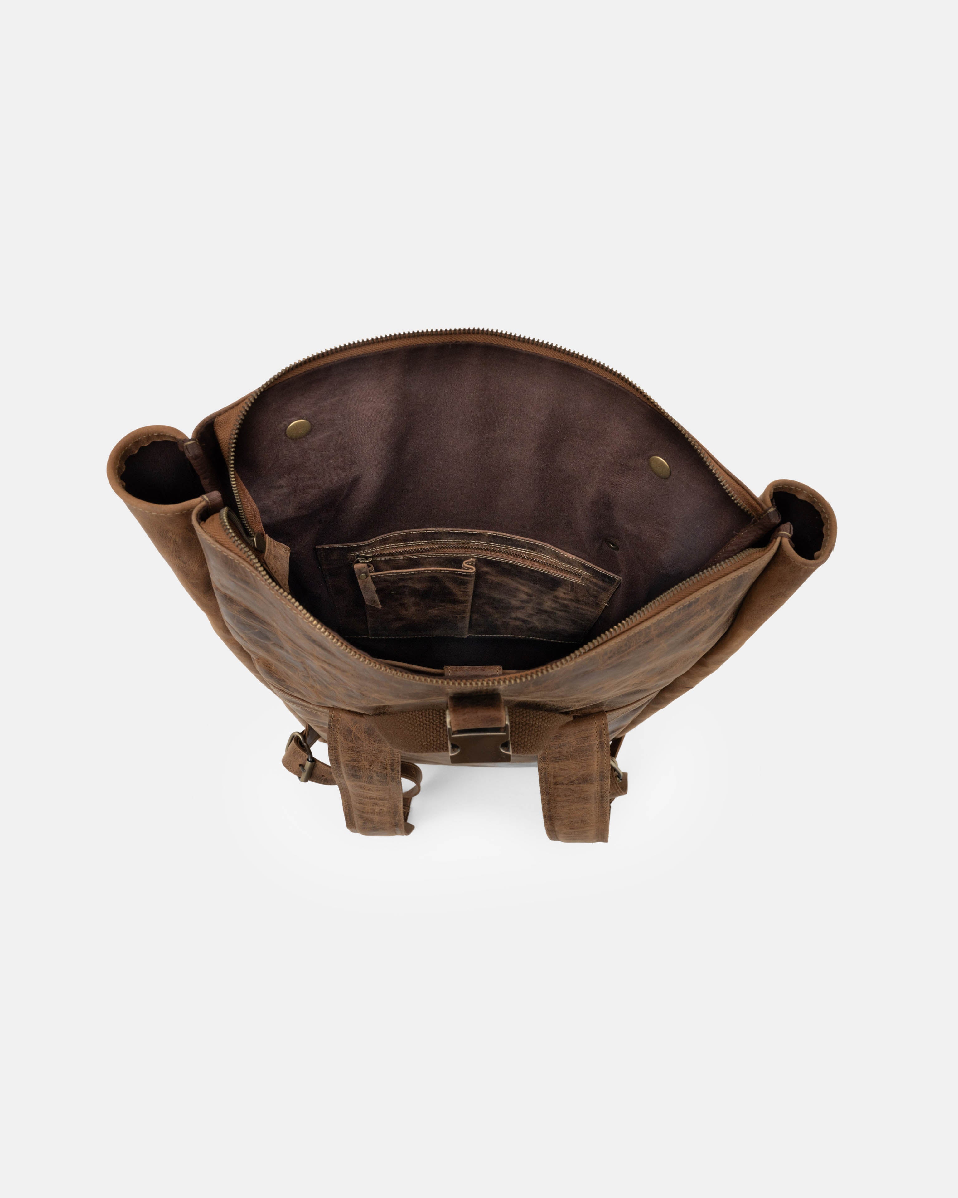 Top view showing open interior of walnut leather backpack bag
