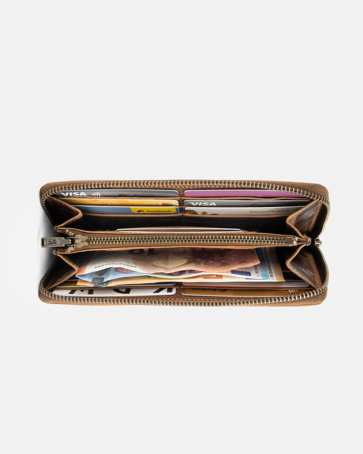 Top-down view of walnut leather wallet showing cash and cards slot inside