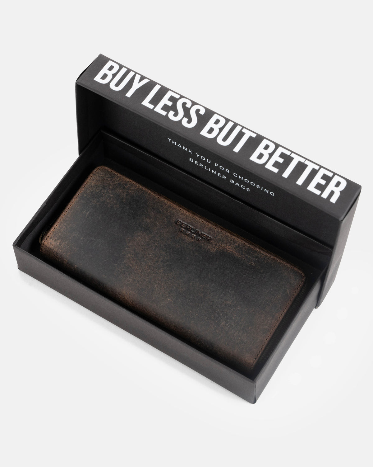 Earth leather wallet inside branded box