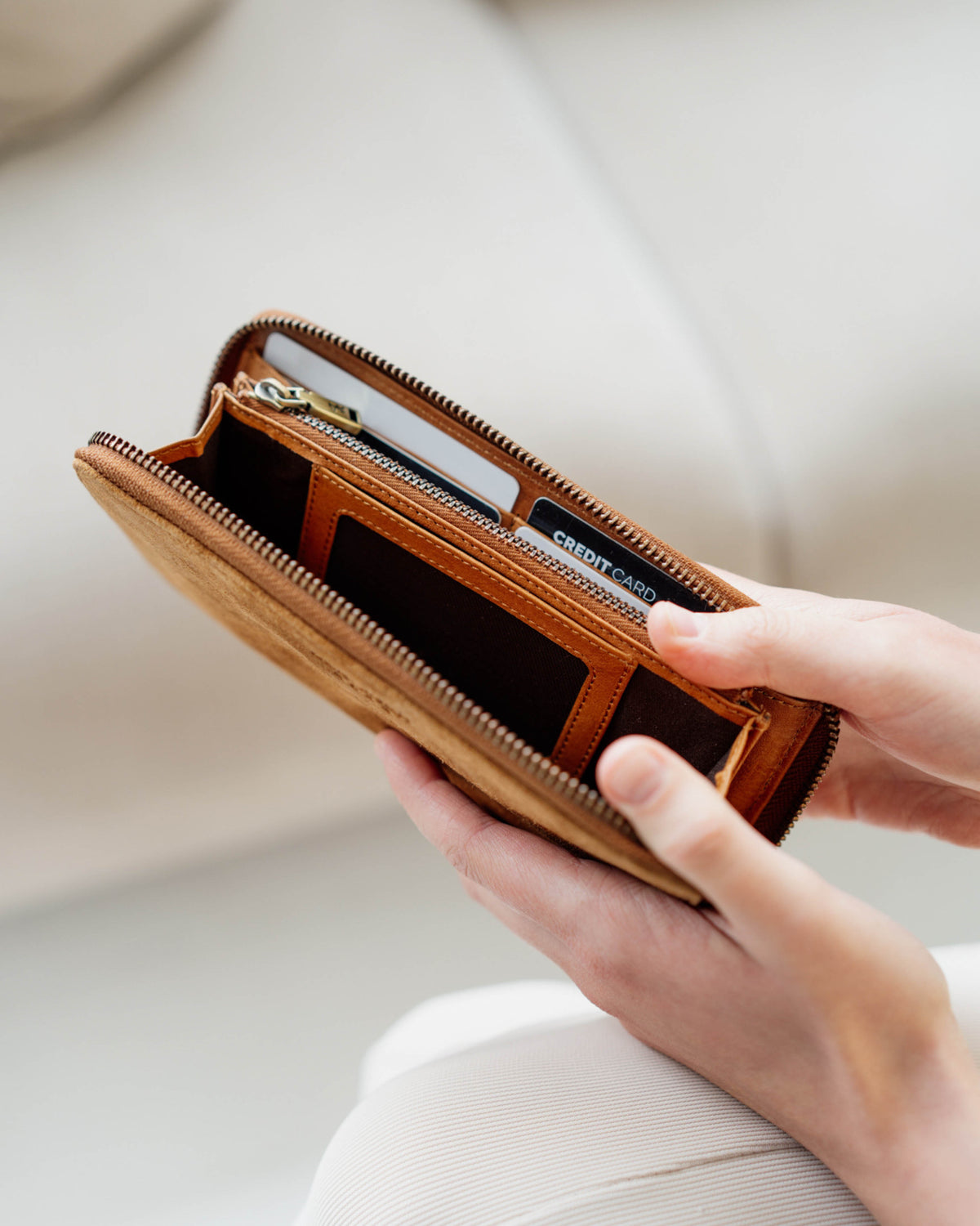 Suede cognac leather wallet with a metal zipper