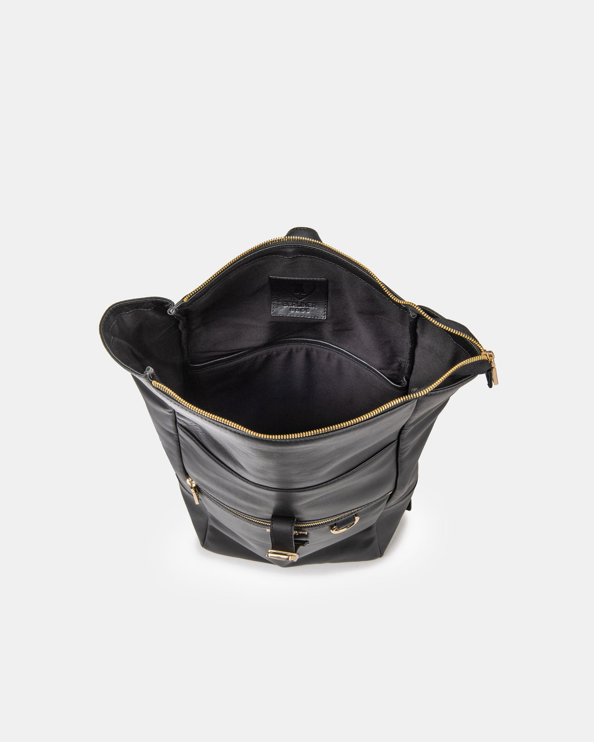 Top-down studio shot showing open empty interior of black-gold backpack