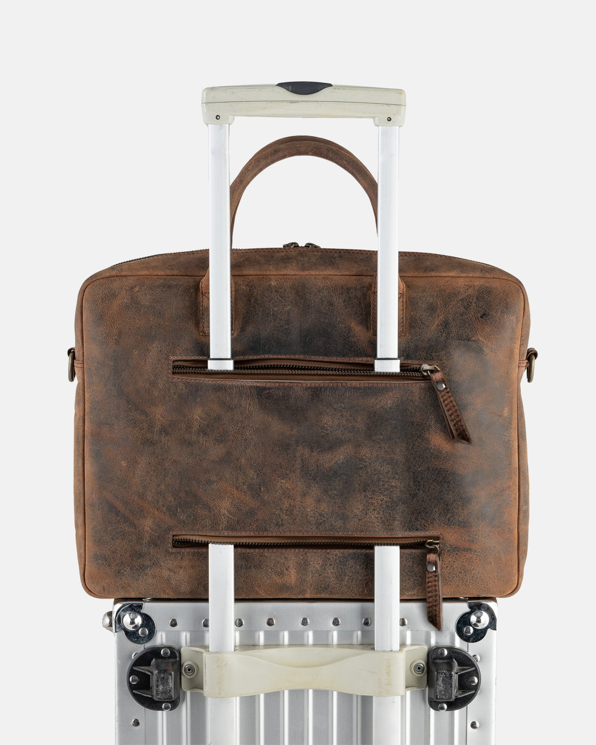 Back view of earth briefcase on luggage