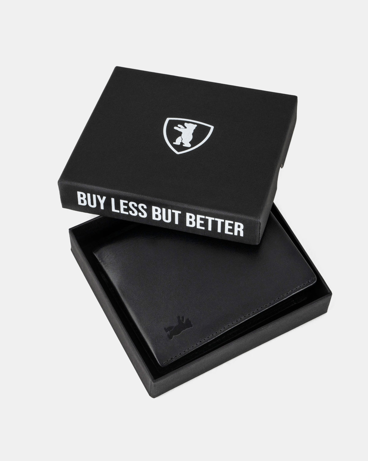 A emboss leather wallet with black zip inside the branded box