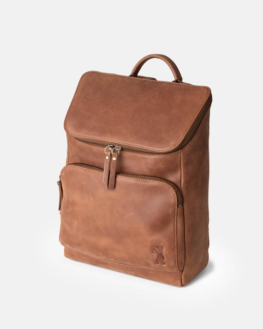 Three-quarter studio view of camel leather zip-around backpack