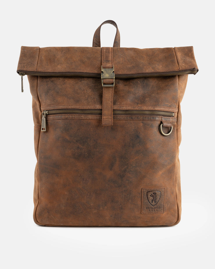 Front view of a earth leather roll-top backpack.